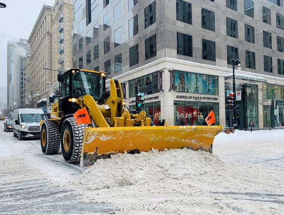 February 16, 2021, Montreal, PQ, Canada: A snow plow works at the intersection of Peel and Sainte Catherine streets during a snowstorm in Montreal, Tuesday, February 16, 2021. Montreal Canada  - ZUMAc35_ 20210216_zaf_c35_011 Copyright: xGrahamxHughesx