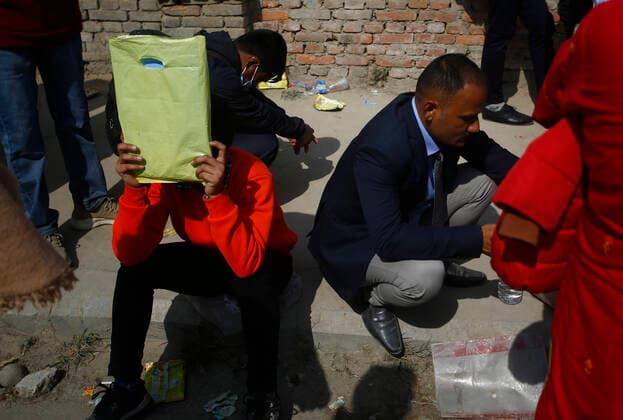 February 17, 2021, Kathmandu, Nepal: People wait in queue for countless hours for an interview to work in gulf countries in a free visa in Kathmandu, Nepal on Wednesday, February 16, 2021. Kathmandu Nepal - ZUMAg200 20210217_zap_g200_002 Copyright: xSkandaxGautamx