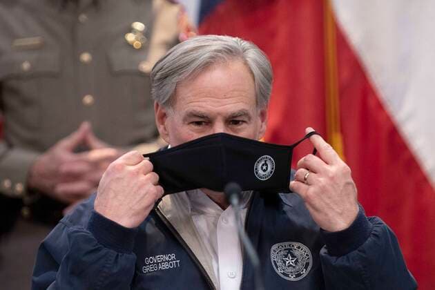 February 17, 2021, Austin, Texas, USA: Texas Gov. GREG ABBOTT puts on his mask after talking with the press and emergency officials in the State Operations Center while Texas deals with record snow and bitter cold in all 254 counties. About a quarter of the state is still without power as officials deploy state resources on a multitude of fronts. Austin USA - ZUMAd150 20210217_znp_d150_021 Copyright: xBobxDaemmrichx