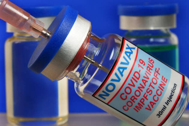 Symbol image syringe with vaccine against Covid 19 Corona vaccination