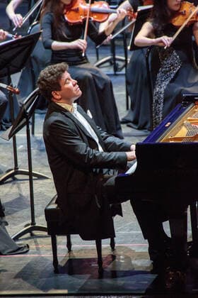 IRKUTSK, RUSSIA - FEBRUARY 19, 2021: Russian pianist Denis Matsuev performs during the opening of the Stars on Baikal International Music Festival at Zagursky Music Theatre. The festival is the first large-scale cultural event in the region since the lifting of COVID-19 restrictions. Alexei Kushnirenko TASS  TS0F743D