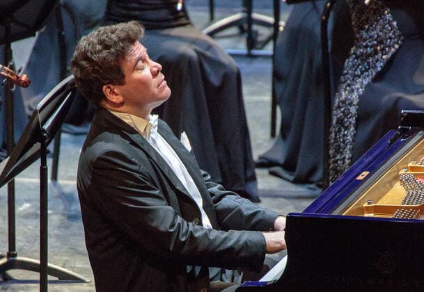 IRKUTSK, RUSSIA - FEBRUARY 19, 2021: Russian pianist Denis Matsuev performs during the opening of the Stars on Baikal International Music Festival at Zagursky Music Theatre. The festival is the first large-scale cultural event in the region since the lifting of COVID-19 restrictions. Alexei Kushnirenko TASS  TS0F7435