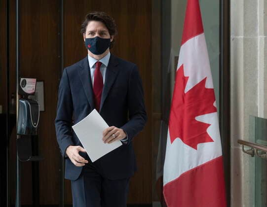 February 19, 2021, Ottawa, on, Canada: Prime Minister Justin Trudeau makes his way to a news news conference in Ottawa, Friday, Feb. 19, 2021. Ottawa Canada  - ZUMAc35_ 20210219_zaf_c35_009 Copyright: xAdrianxWyldx