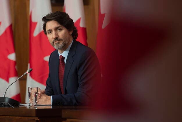 February 19, 2021, Ottawa, on, Canada: Prime Minister Justin Trudeau listens to a question during a news conference in Ottawa, Friday, Feb. 19, 2021. Ottawa Canada  - ZUMAc35_ 20210219_zaf_c35_011 Copyright: xAdrianxWyldx