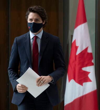 February 19, 2021, Ottawa, on, Canada: Prime Minister Justin Trudeau makes his way to a news news conference in Ottawa, Friday, Feb. 19, 2021. Ottawa Canada  - ZUMAc35_ 20210219_zaf_c35_013 Copyright: xAdrianxWyldx