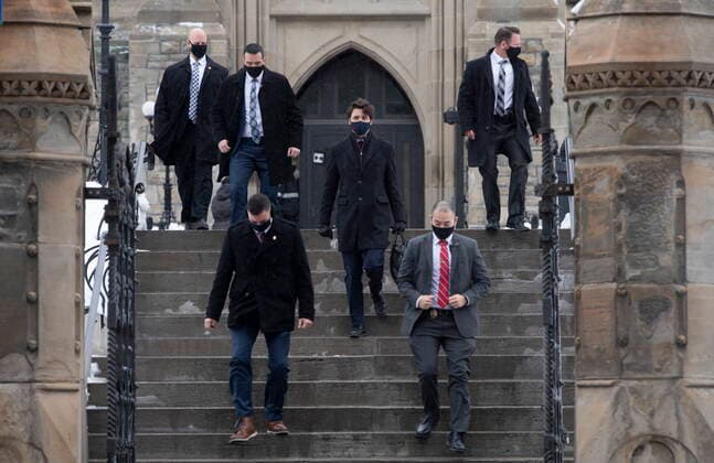 February 19, 2021, Ottawa, on, Canada: Prime Minister Justin Trudeau makes his way to a news news conference in Ottawa, Friday, Feb. 19, 2021. Ottawa Canada  - ZUMAc35_ 20210219_zaf_c35_014 Copyright: xAdrianxWyldx