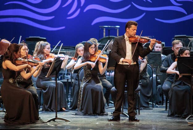 IRKUTSK, RUSSIA - FEBRUARY 19, 2021: Austrian violinist Julian Rachlin performs during the opening of the Stars on Baikal International Music Festival at Zagursky Music Theatre. The festival is the first large-scale cultural event in the region since the lifting of COVID-19 restrictions. Alexei Kushnirenko TASS  TS0F7448