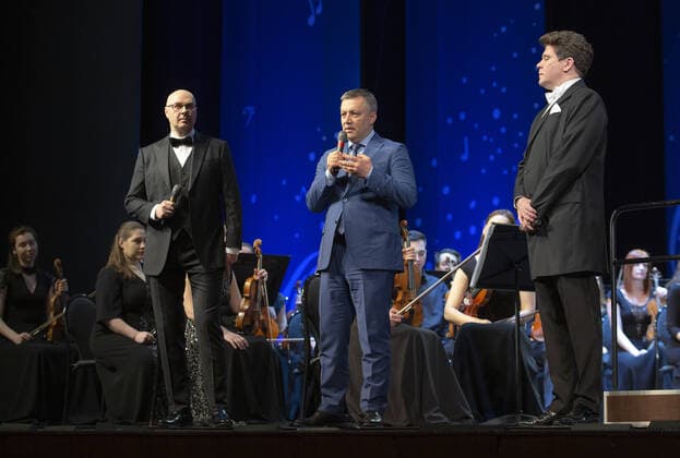 IRKUTSK, RUSSIA - FEBRUARY 19, 2021: Actor, TV presenter Yulian Makarov, Irkutsk Region Governor Igor Kobzev and Russian pianist Denis Matsuev (L-R) attend the opening of the Stars on Baikal International Music Festival at Zagursky Music Theatre. The festival is the first large-scale cultural event in the region since the lifting of COVID-19 restrictions. Alexei Kushnirenko TASS  TS0F744A
