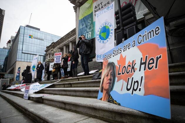 February 20, 2021, Vancouver, BC, Canada: A sign bearing a photograph of B.C. Provincial Health Officer Dr. Bonnie Henry is displayed as people opposed to public health measures to curb the spread of COVID-19 attend the B.C. Grand Freedom Rally, in Vancouver, on Saturday, February 20, 2021. Vancouver Canada  - ZUMAc35_ 20210220_zaf_c35_040 Copyright: xDarrylxDyckx