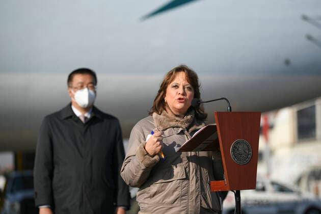 (210221) -- MEXICO CITY, Feb. 21, 2021 -- Mexican Deputy Foreign Minister for Multilateral Affairs Martha Delgado (R) speaks at the arrival of the first shipment of COVID-19 vaccines from Chinese company Sinovac at the airport, in Mexico City, Mexico, Feb. 20, 2021. The first shipment of COVID-19 vaccines from Chinese company Sinovac arrived in Mexico City on Saturday, authorities reported. ) MEXICO-MEXICO CITY-CHINA-SINOVAC-VACCINE-ARRIVAL XinxYuewei 