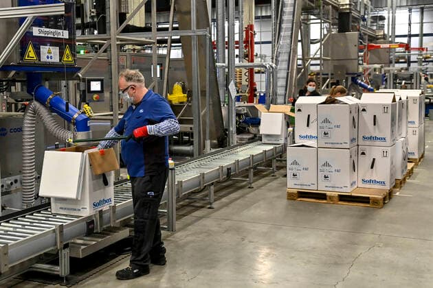 Illustration picture taken during a visit of EU Commissioner Breton to the packaging line at the Pfizer production plant in Puurs, Monday 22 February 2021. The Covid-19 vaccin of Pfizer-BioNTech is produced in Puurs.  DIRKxWAEM 2649879