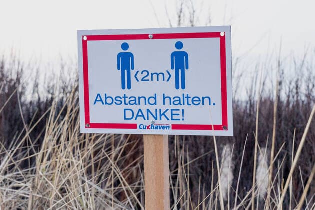 sign keep distance at the beach promenade in Cuxhaven in Lower Saxony sign keep distance at the beach promenade in Cuxhaven in Lower Saxony, Hamburg Hamburg Germany Cinemaxx Dammtor