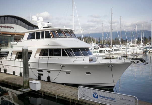 (210224) -- VANCOUVER, Feb. 24, 2021 -- A cruiser boat for display during the 2021 Vancouver International Boat Show is seen at a harbour in Vancouver, British Columbia, Canada, Feb. 24, 2021. The Vancouver International Boat Show which goes virtual this year due to the COVID-19 pandemic, kicked off on Wednesday, showcasing hundreds of new boats, products and accessories online. (Photo by Xinhua) CANADA-VANCOUVER-INTERNATIONAL BOAT SHOW LiangxSen 