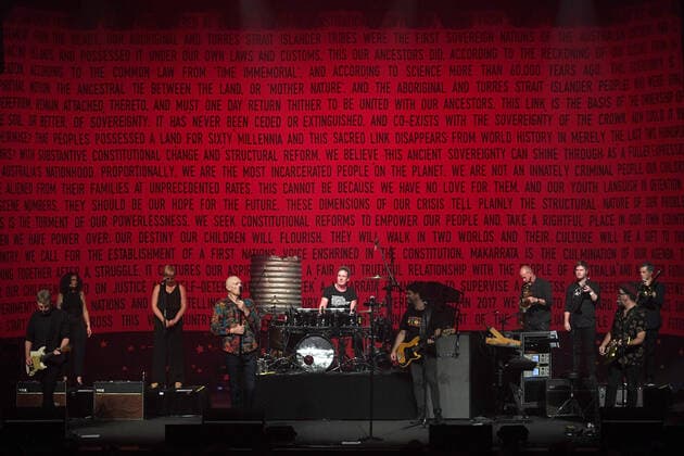 MIDNIGHT OIL MAKARRATA LIVE SYDNEY, The Uluru Statement of the Heart is seen as a backdrop as Midnight Oil perform during a warm-up show ahead of their Makarrata Project tour, at the Enmore Theatre, in Sydney, Thursday, February 25, 2021. ( NO ARCHIVING, EDITORIAL USE ONLY, NO USE IN BOOKS WITHOUT CONSENT SYDNEY NSW AUSTRALIA  Copyright: xDANxHIMBRECHTSx 20210225001523166308