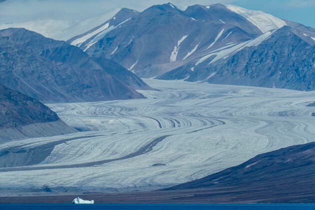Tidewater glaciers and ice-capped mountains in Eclipse Sound, Nunavut, Canada, North America Copyright: MichaelxNolan 1112-5746