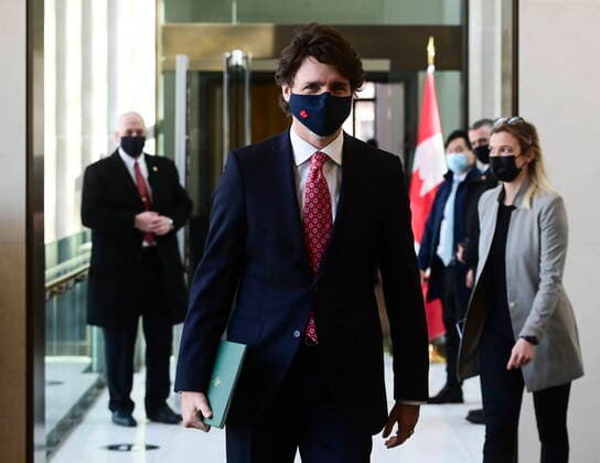 February 26, 2021, Ottawa, on, Canada: Prime Minister Justin Trudeau makes his way to hold a press conference in Ottawa on Friday, Feb. 26, 2021, to provide an update on the COVID-19 pandemic and vaccine roll-out in Canada. Ottawa Canada  - ZUMAc35_ 20210226_zaf_c35_021 Copyright: xSeanxKilpatrickx
