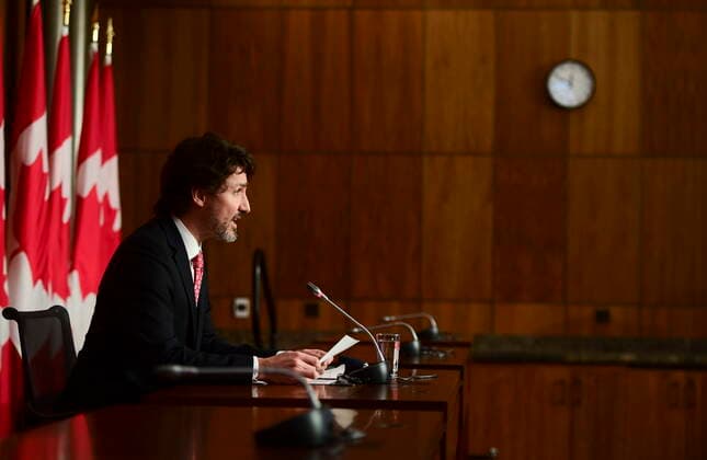 February 26, 2021, Ottawa, on, Canada: Prime Minister Justin Trudeau holds a press conference in Ottawa on Friday, Feb. 26, 2021, to provide an update on the COVID-19 pandemic and vaccine roll-out in Canada. Ottawa Canada  - ZUMAc35_ 20210226_zaf_c35_024 Copyright: xSeanxKilpatrickx