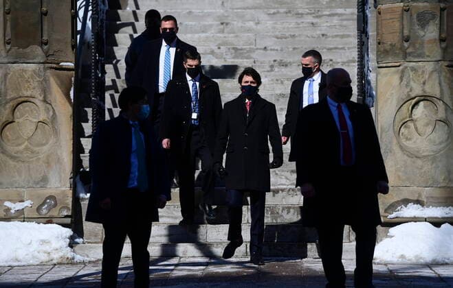 February 26, 2021, Ottawa, on, Canada: Prime Minister Justin Trudeau makes his way to hold a press conference in Ottawa on Friday, Feb. 26, 2021, to provide an update on the COVID-19 pandemic and vaccine roll-out in Canada. Ottawa Canada  - ZUMAc35_ 20210226_zaf_c35_025 Copyright: xSeanxKilpatrickx