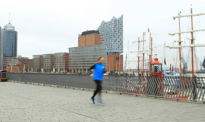 Almost deserted harbour promenade in Hamburg during the lockdown In the background the Elbphilharmonie Old Town Hamburg