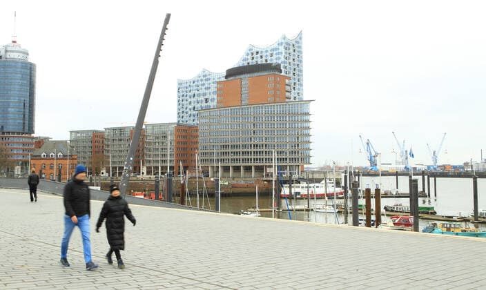Almost deserted harbour promenade in Hamburg during the lockdown In the background the Elbphilharmonie Old Town Hamburg