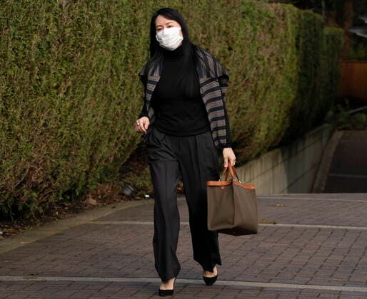 March 1, 2021, Vancouver, BC, Canada: Meng Wanzhou, chief financial officer of Huawei, leaves her home in Vancouver to attend a court hearing, Monday, March 1, 2021. Vancouver Canada  - ZUMAc35_ 20210301_zaf_c35_023 Copyright: xJonathanxHaywardx