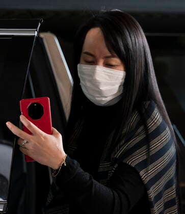 March 1, 2021, Vancouver, BC, Canada: Meng Wanzhou, chief financial officer of Huawei, arrives at B.C. Supreme Court in Vancouver, Monday, March 1, 2021. Vancouver Canada  - ZUMAc35_ 20210301_zaf_c35_025 Copyright: xJonathanxHaywardx