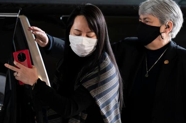 March 1, 2021, Vancouver, BC, Canada: Meng Wanzhou, chief financial officer of Huawei, arrives at B.C. Supreme Court in Vancouver, Monday, March 1, 2021. Vancouver Canada  - ZUMAc35_ 20210301_zaf_c35_026 Copyright: xJonathanxHaywardx