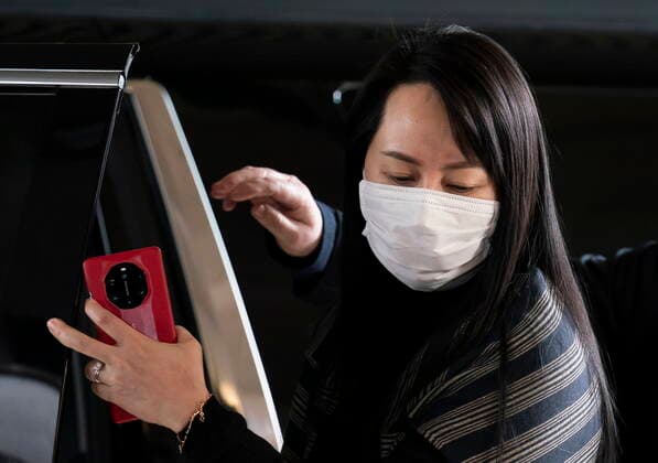 March 1, 2021, Vancouver, BC, Canada: Meng Wanzhou, chief financial officer of Huawei, arrives at B.C. Supreme Court in Vancouver, Monday, March 1, 2021. Vancouver Canada  - ZUMAc35_ 20210301_zaf_c35_027 Copyright: xJonathanxHaywardx