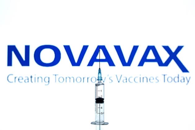 March 2, 2021, Barcelona, Catalonia, Spain: In this photo illustration a medical syringe seen displayed in front of the Novavax logo. Barcelona Spain - ZUMAd159 20210302_zia_d159_005 Copyright: xThiagoxPrudenciox