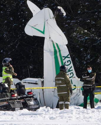 March 3, 2021, Gore, PQ, Canada: Police investigate the scene where a small plane crashed into Lac Barron Wednesday, March 3, 2021 in Gore, Que. Police have not said if there were any injuries. Gore Canada  - ZUMAc35_ 20210303_zaf_c35_035 Copyright: xRyanxRemiorzx