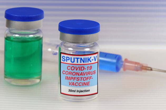 Symbol image Coronaserum vaccine can with syringe Corona vaccine