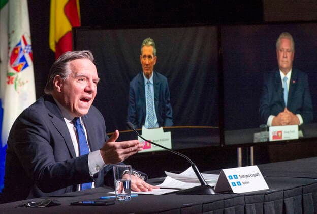 March 4, 2021, Montreal, PQ, Canada: Quebec Premier Francois Legault chairs a premiers virtual news conference as premiers Brian Pallister, Manitoba, and Doug Ford, Ontario, are seen on screen, Thursday, March 4, 2021 in Montreal. Montreal Canada  - ZUMAc35_ 20210304_zaf_c35_034 Copyright: xRyanxRemiorzx