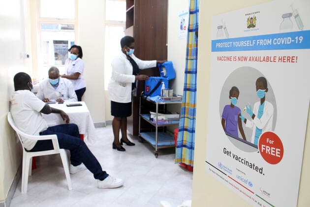 (210306) -- NAIROBI, March 6, 2021 -- A resident prepares to receive a shot of the AstraZeneca COVID-19 vaccine at Kenyatta National Hospital in Nairobi, Kenya, March 5, 2021. Kenya s health ministry on Friday kicked off COVID-19 vaccination campaign with frontline health workers as the first to receive the vaccine. (Photo by Xinhua) KENYA-NAIROBI-COVID-19-VACCINATION JoyxNabukewa 