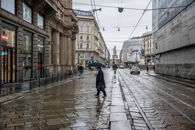 Milan. Dark Orange Zone few people in the street through the streets of the center Editorial Usage Only  Copyright: xCarloxCozzolix xIPAx