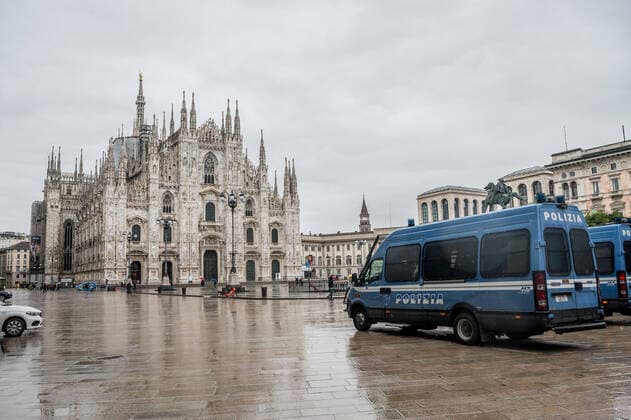 Milan. Dark Orange Zone few people in the street through the streets of the center Editorial Usage Only  Copyright: xCarloxCozzolix xIPAx