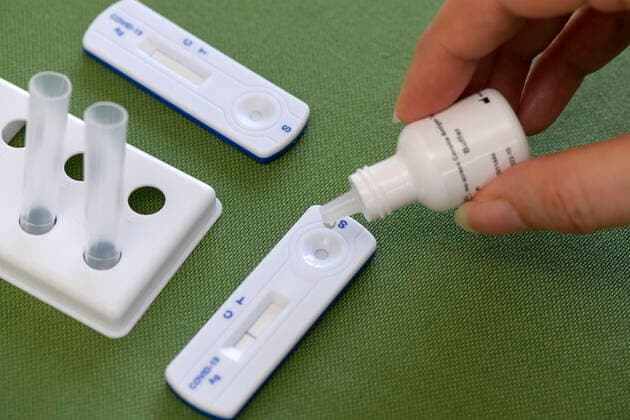 07 03 2021, A COVID 19 Antigen Test Kit Rapid Home Test The Corona Antigen Test is a test for the qualitative detection of nucleocapsid protein antigen from SARS CoV 2 in nasal swab specimens from individuals s