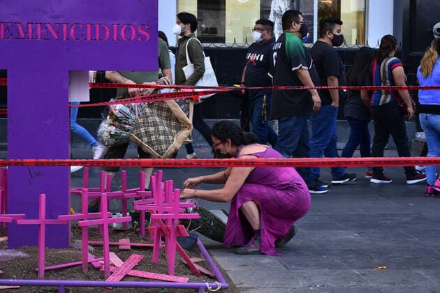 Women Take Part To Paint Femicide Slogans MEXICO CITY, MEXICO - MARCH 7: A woman puts flowers on a monument placed as a symbol against femicides in Mexico as part of the World Women s Day at Bellas Artes palace on March 7, 2021 in Mexico City, Mexico Copyright: xCarlosxTischlerx EYEPIXGROUP_CT_07032021_4253