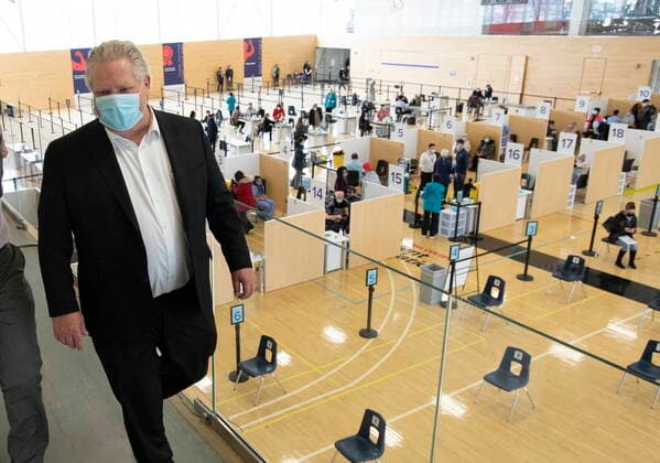 March 8, 2021, Toronto, on, Canada: Ontario Premier Doug Ford tours a COVID-19 mass vaccination clinic in Toronto on Monday, March 8, 2021. Toronto Canada  - ZUMAc35_ 20210308_zaf_c35_045 Copyright: xFrankxGunnx