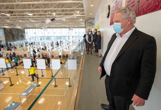 March 8, 2021, Toronto, on, Canada: Ontario Premier Doug Ford tours a COVID-19 mass vaccination clinic in Toronto on Monday, March 8, 2021. Toronto Canada  - ZUMAc35_ 20210308_zaf_c35_047 Copyright: xFrankxGunnx