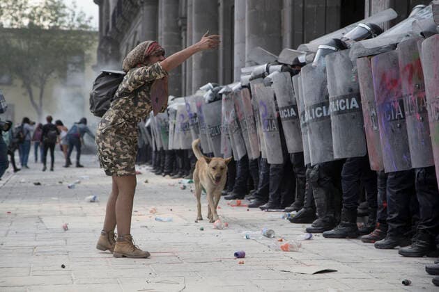 Women Commemorate International Women™s Day In Mexico TOLUCA, MEXICO - MARCH 8: A women confront a police line during the riots caused for the protests against gender violence as part of the commemoration of International Women™s Day at downtown on March 8, 2021 in Toluca, Mexico Copyright: xLeonardoxCasasx EYEPIXGROUP_LC_08032021_4520
