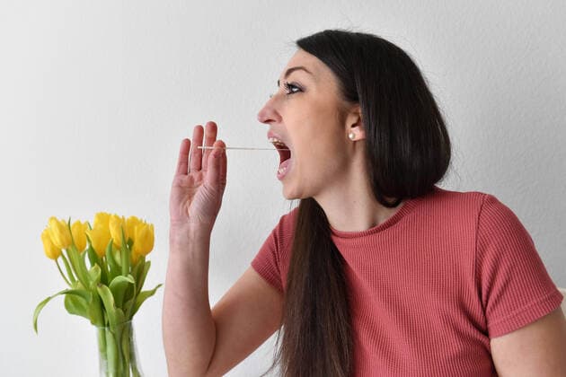 Topic Image Corona Antigen Test,Rapid Test, Corona Rapid Test Self-Test Every federal citizen should be entitled to one free rapid test per week A young woman performs a self-test and takes a throat swab at home, MODEL RELEASED
