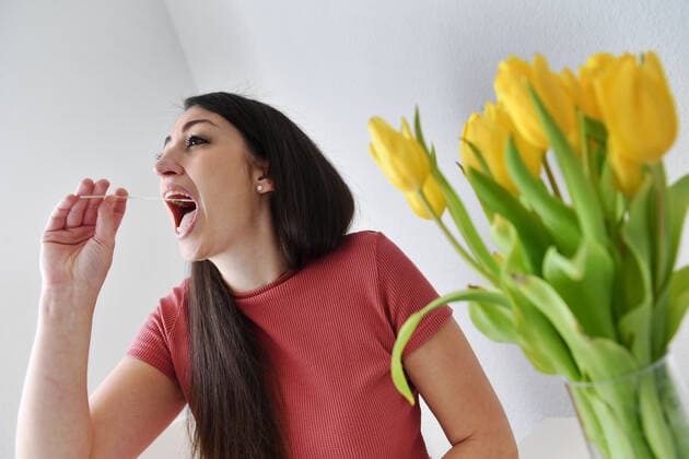 Topic Image Corona Antigen Test,Rapid Test, Corona Rapid Test Self-Test Every federal citizen should be entitled to one free rapid test per week A young woman performs a self-test and takes a throat swab at home, MODEL RELEASED