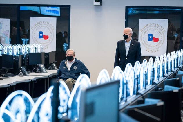 Feb 26, 2021 - Houston, Texas, USA - President Joe Biden walks with Texas Gov. Greg Abbott Friday, Feb. 26, 2021, at the Harris County Emergency Operations Center in Houston. Houston USA - ZUMAz03_ 20210226_sha_z03_494 Copyright: xWhitexHousex