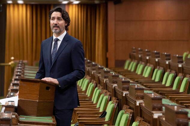 March 11, 2021, Ottawa, on, Canada: Prime Minister Justin Trudeau rises to deliver a statement on the National Day of Observance of COVID-19, to recognize victims and the impacts of pandemic, in the House of Commons, in Ottawa, Thursday, March 11, 2021. Ottawa Canada - ZUMAc35_ 20210311_zaf_c35_009 Copyright: xAdrianxWyldx