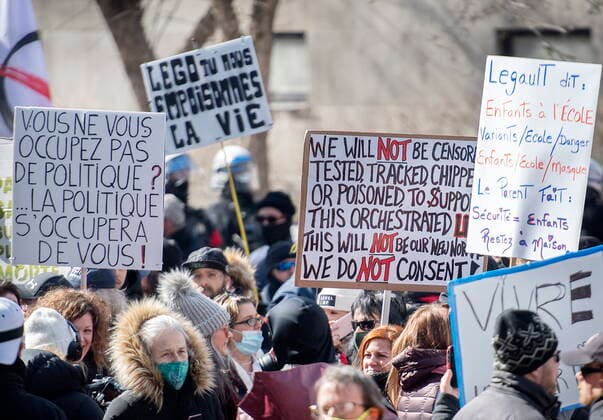 March 13, 2021, Montreal, PQ, Canada: People take part in a demonstration to oppose government restrictions to curb the spread of Covid-19 in Montreal, Saturday, March 13, 2021, as the COVID-19 pandemic continues in Canada and around the world. Montreal Canada  - ZUMAc35_ 20210313_zaf_c35_008 Copyright: xGrahamxHughesx