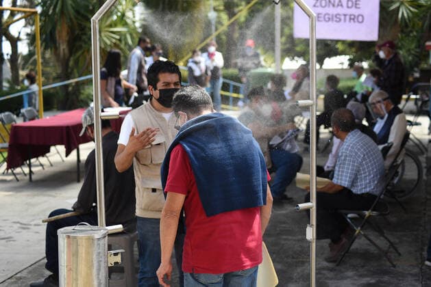 March 13, 2021: Thousands of older adults received the COVID-19 vaccine in the city of Xalapa. From early on they made lines and for their application they were sanitized and did body activation exercises. - ZUMAqp1_ 20210313_zip_qp1_008 Copyright: xHectorxAdolfoxQuintanarxPerezx