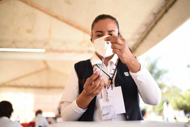 March 13, 2021: Thousands of older adults received the COVID-19 vaccine in the city of Xalapa. From early on they made lines and for their application they were sanitized and did body activation exercises. - ZUMAqp1_ 20210313_zip_qp1_011 Copyright: xHectorxAdolfoxQuintanarxPerezx