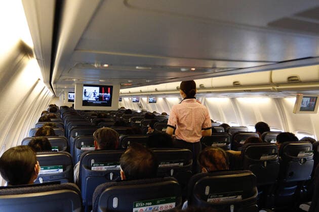 March 11, 2021, Tokyo, Japan: Passengers are seen sit in an All Nippon Airways (ANA) Plane. .All Nippon Airways Co. said it will suspend services on 16 international flight routes from late March due to falling travel demand amid the coronavirus pandemic. Tokyo Japan - ZUMAs197 20210311_zaa_s197_333 Copyright: xJamesxMatsumotox