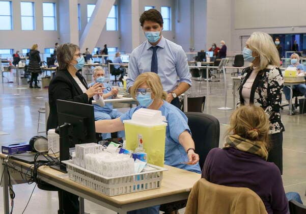 March 15, 2021, Montreal, PQ, Canada: Prime Minister Justin Trudeau tours a COVID-19 vaccination clinic in Montreal on Monday, March 15, 2021. Montreal Canada  - ZUMAc35_ 20210315_zaf_c35_003 Copyright: xPaulxChiassonx