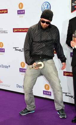 Award winner Sido with Echo award in a unique pose at the Echo 2012 the German Music Award Award winner before the ceremony at the Messe Berlin Copyright: xEventpressxHerrmannx